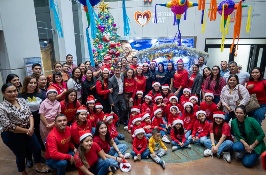  Preside rector encendido del pino navideño Familia UAT